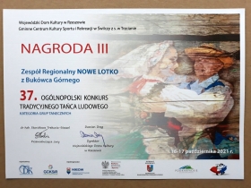 Dyplom dla Zespołu Regionalnego „Nowe Lotko” z Bukówca Górnego za zajęcie III miejsca na 37. Ogólnopolskim Konkursie Tradycyjnego Tańca Ludowego 